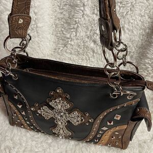 Western synthetic black and brown studded bling shoulder bag. .